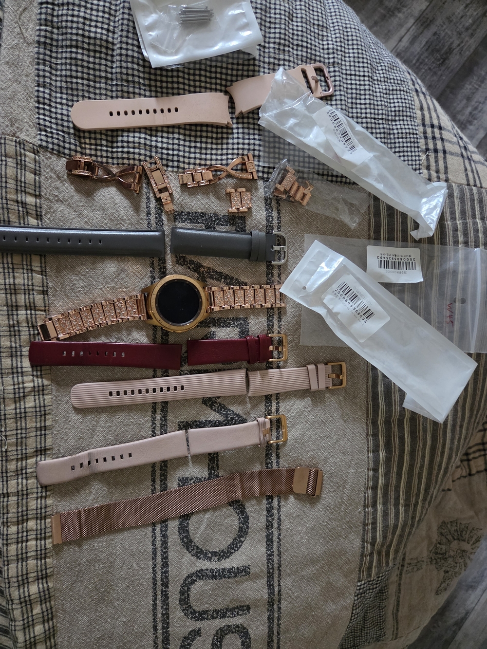 Rose Gold Smartwatch with Interchangeable Pink and Gray Bands